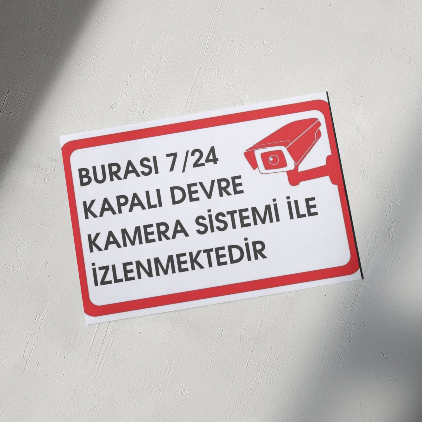 Burası 7/24 kapalı devre kamera sistemi ile izlenmektedir uyarı levhası, duvar üzerinde kullanımı gösteren 25x35 cm güvenlik tabelası