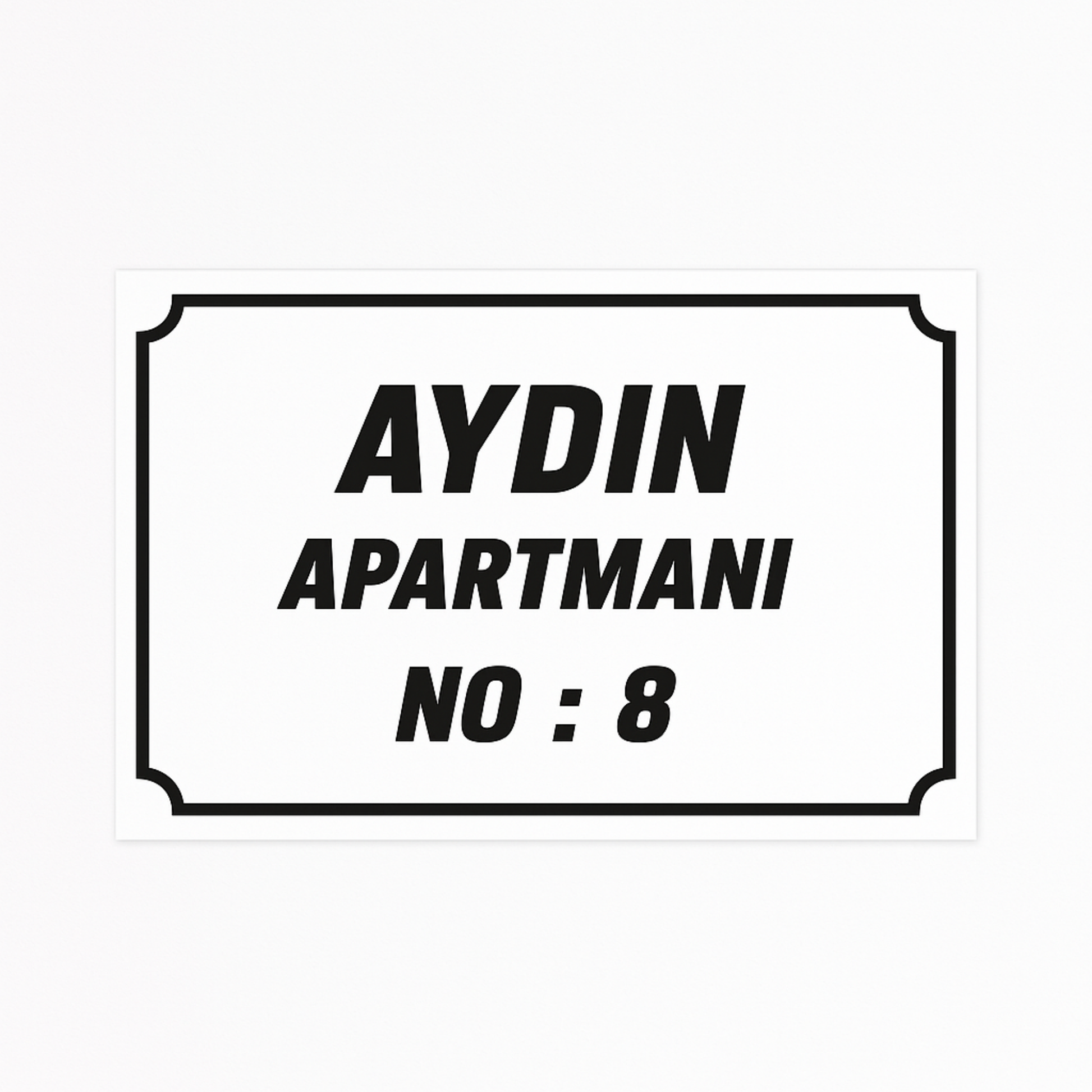 Kişiye özel apartman adı ve numara yazılı beyaz pleksi tabela ürün görseli, siyah çerçeveli tasarım